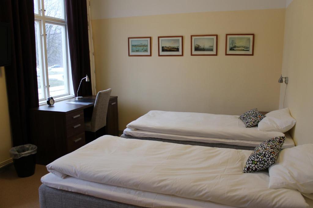 Stationshusets Hotell Och Cafe Köping Стая снимка