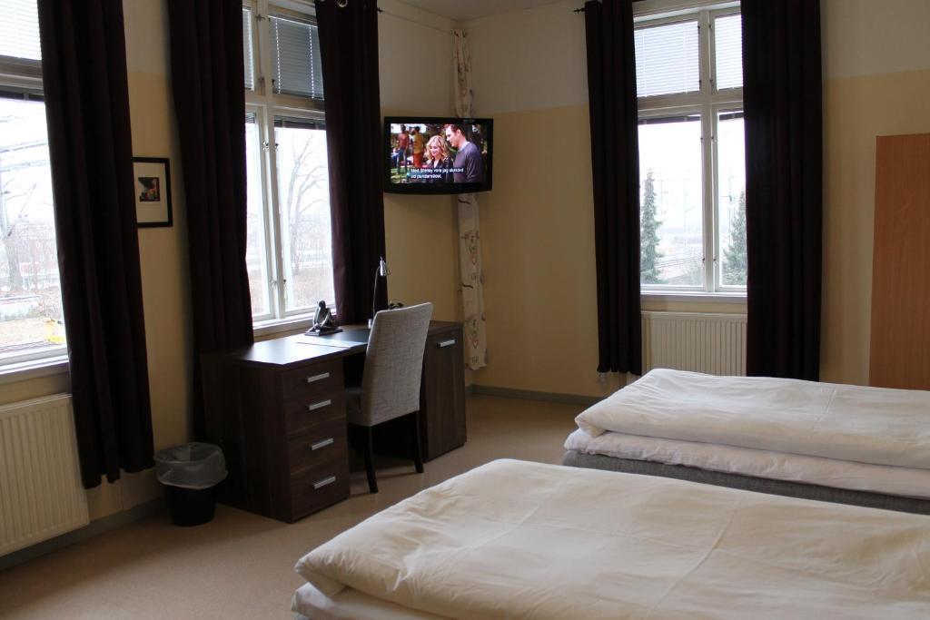 Stationshusets Hotell Och Cafe Köping Стая снимка